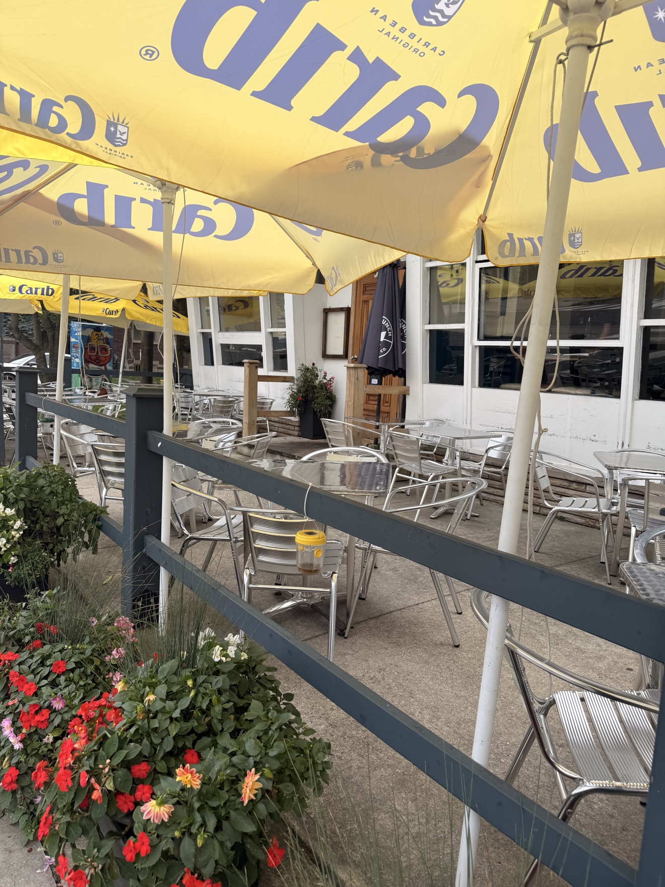 Patio umbrellas and flowers at Lighthouse 971